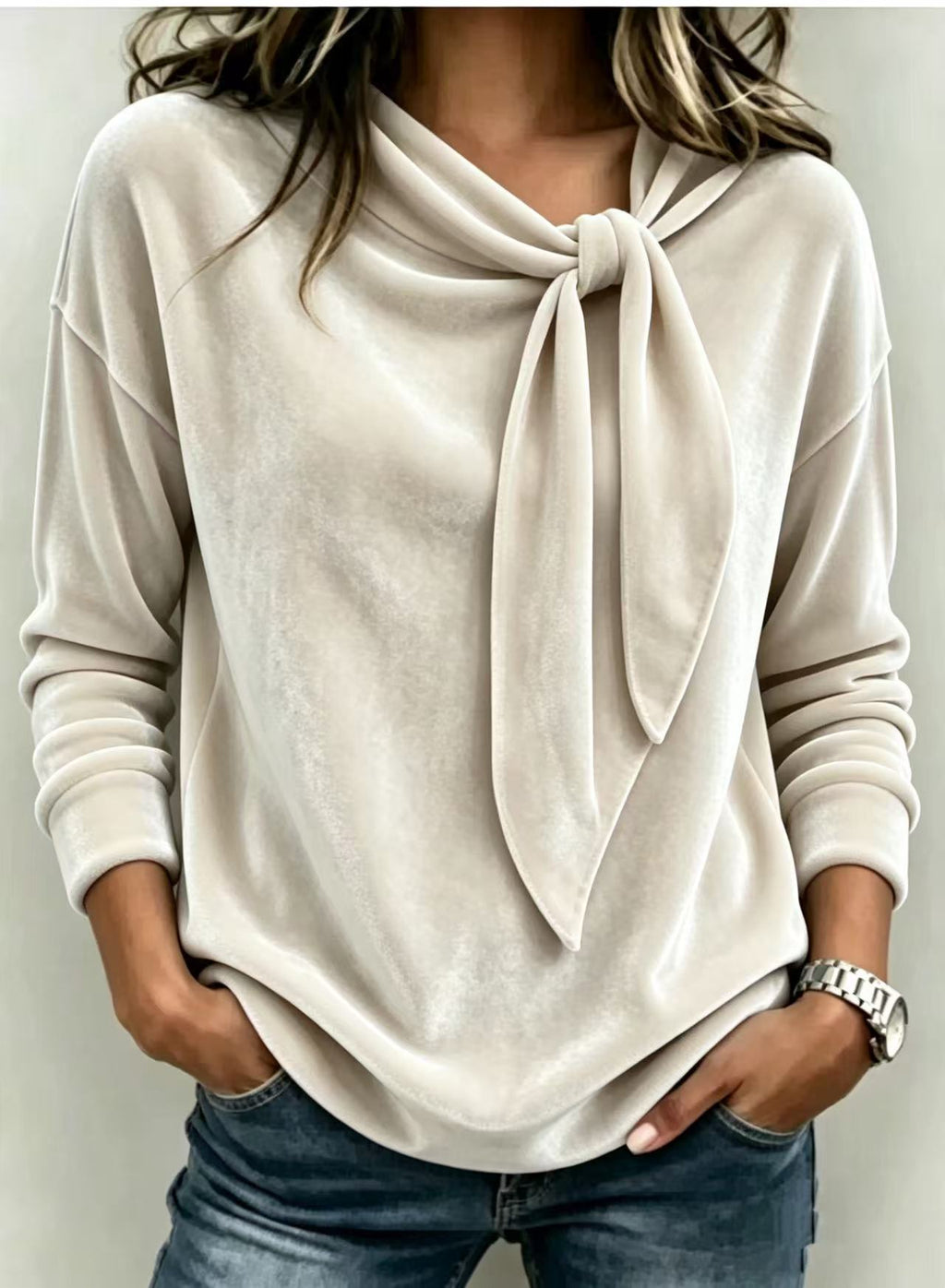 Solid color long sleeved bow top