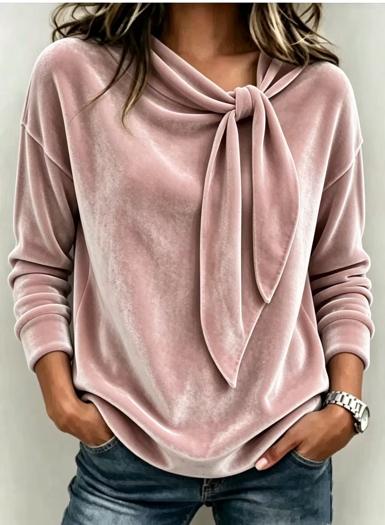 Solid color long sleeved bow top