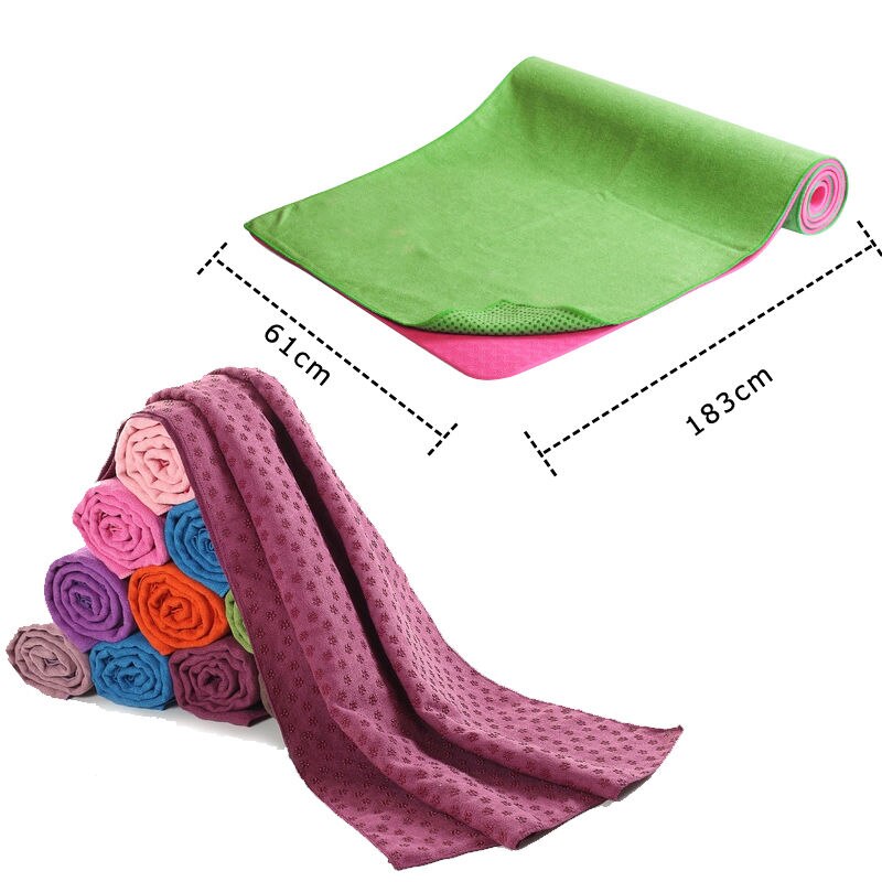Non slip yoga mat towel in vibrant colors, highlighting the effective slip resistance and absorbency for fitness and exercise.