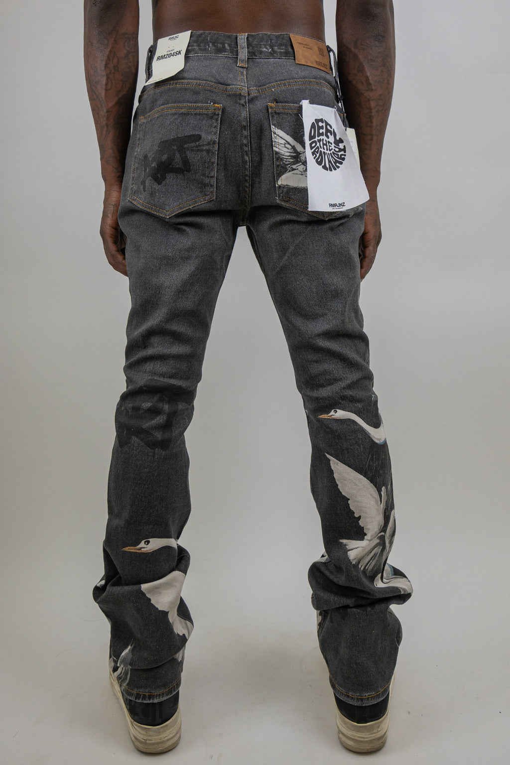 RM204SK - Graphic Printed Stacked Jeans
